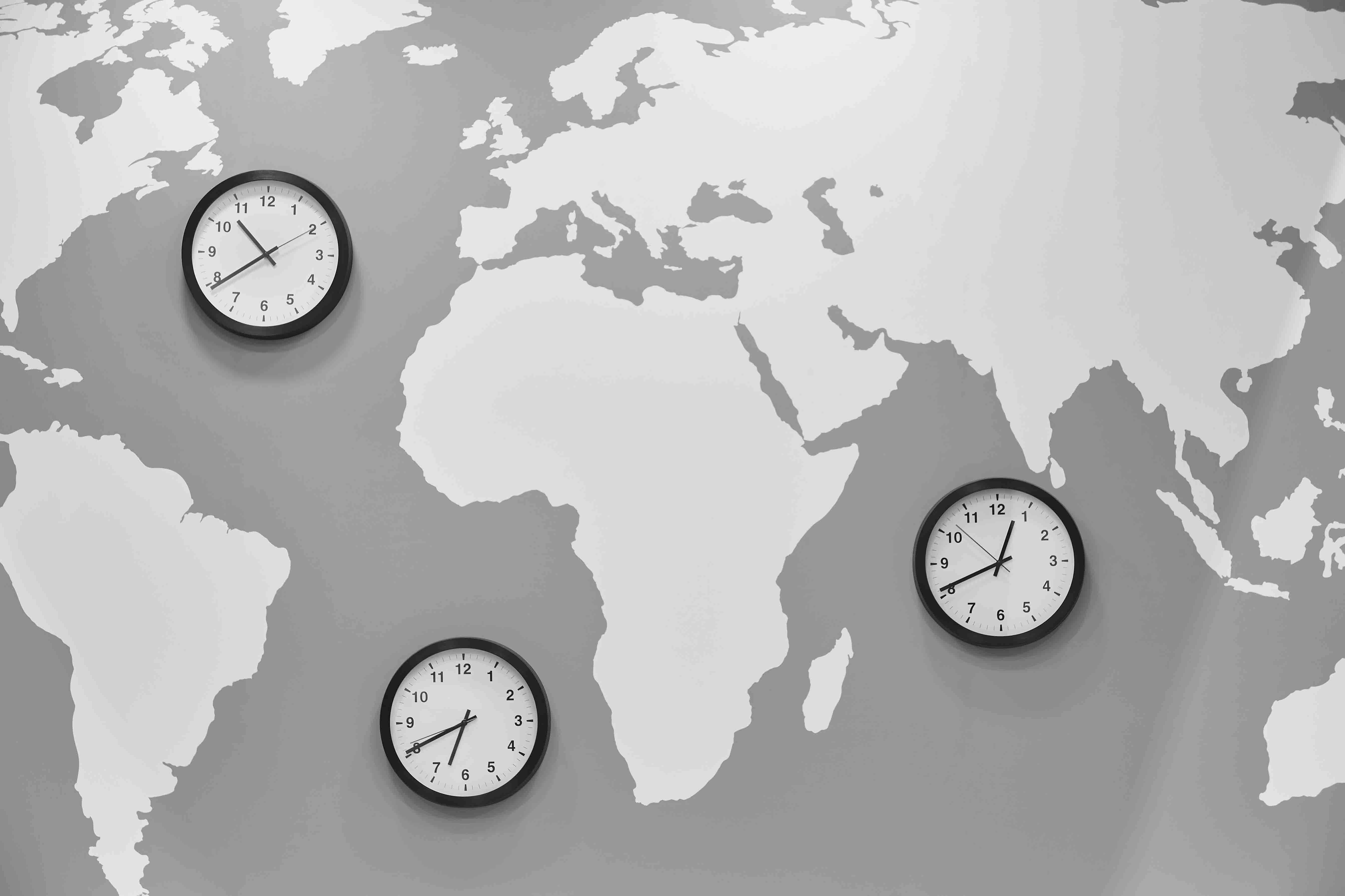 clocks in a world map global time travel and geo