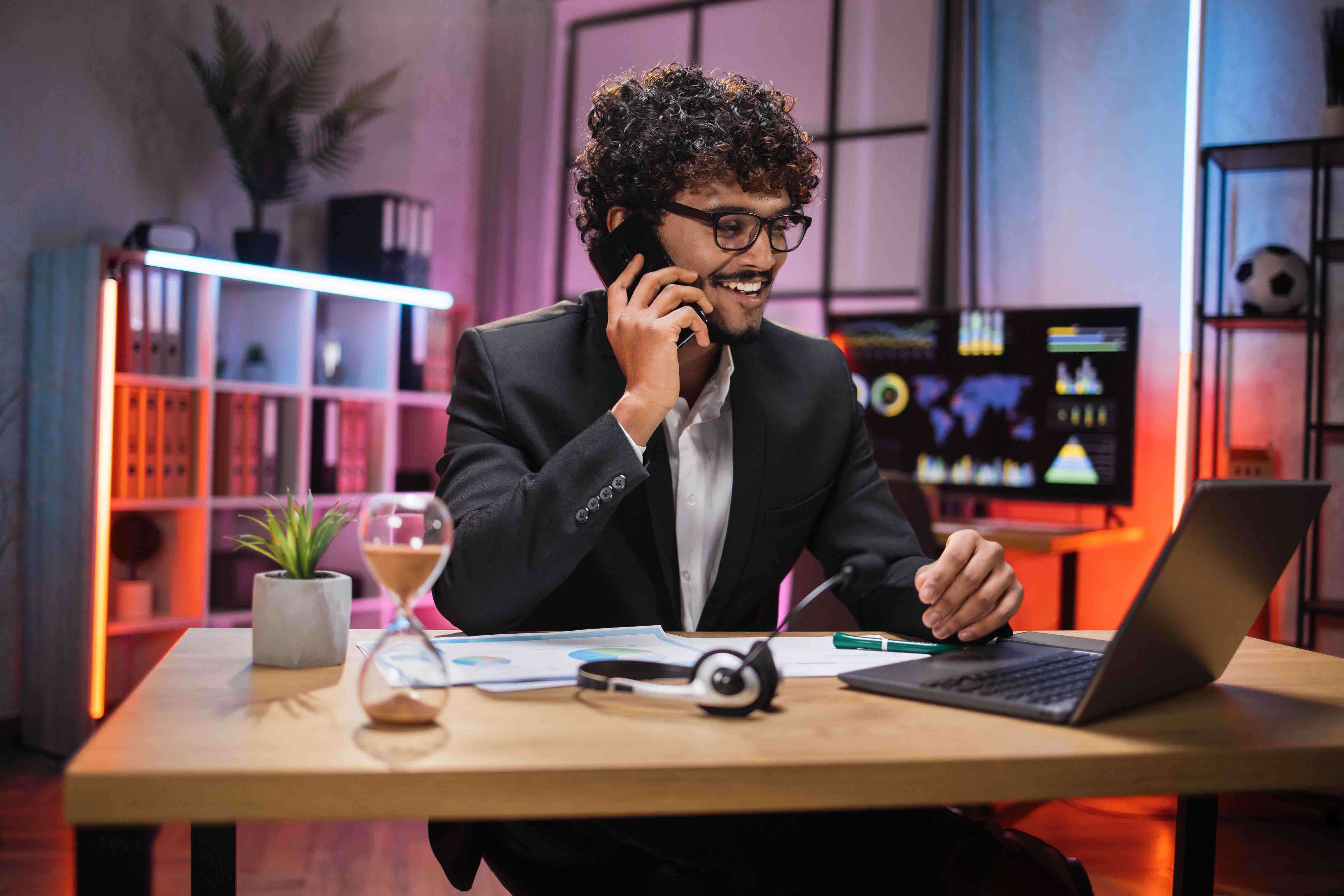 working process at office of young confident guy