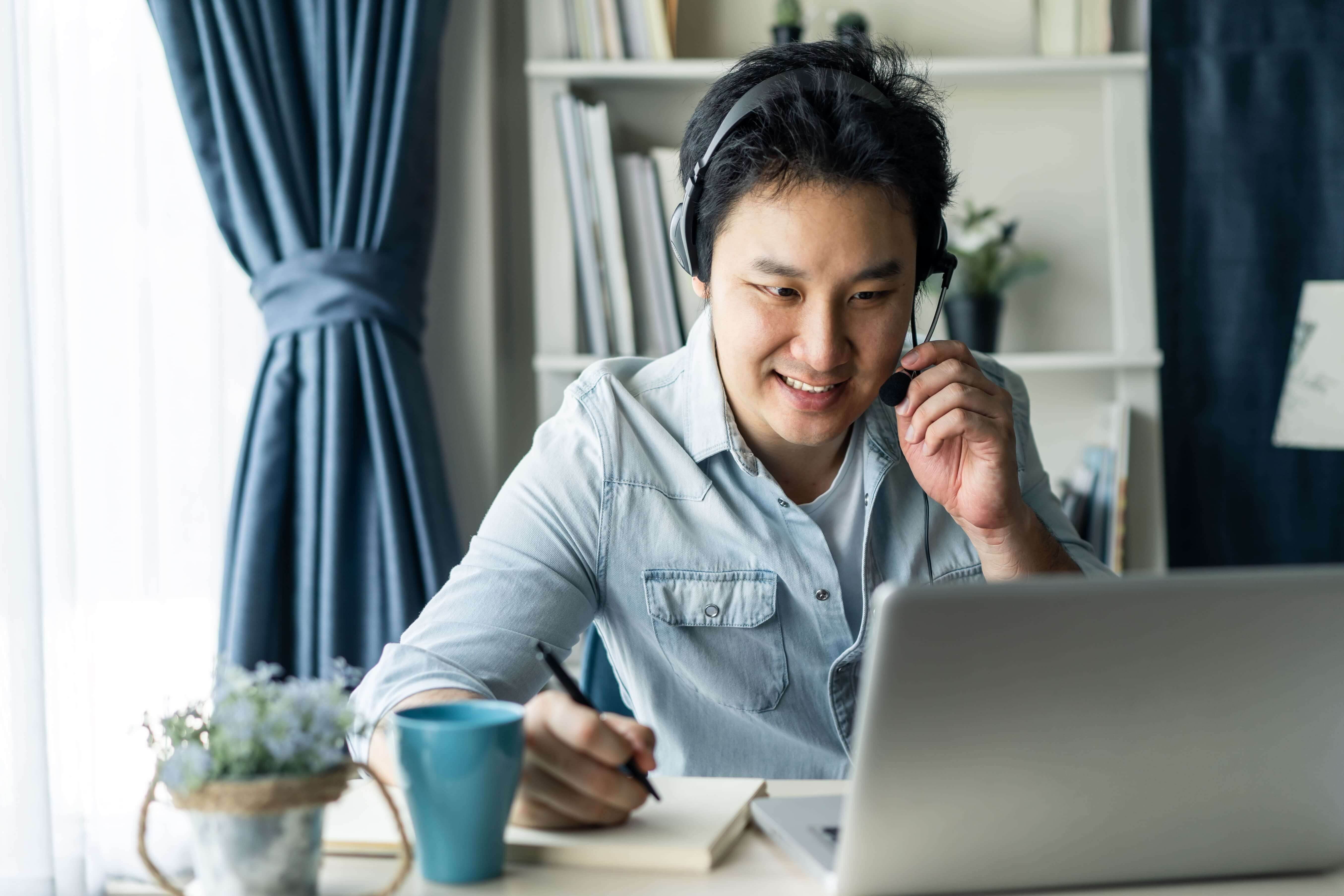 asian businessman talking to client in call
