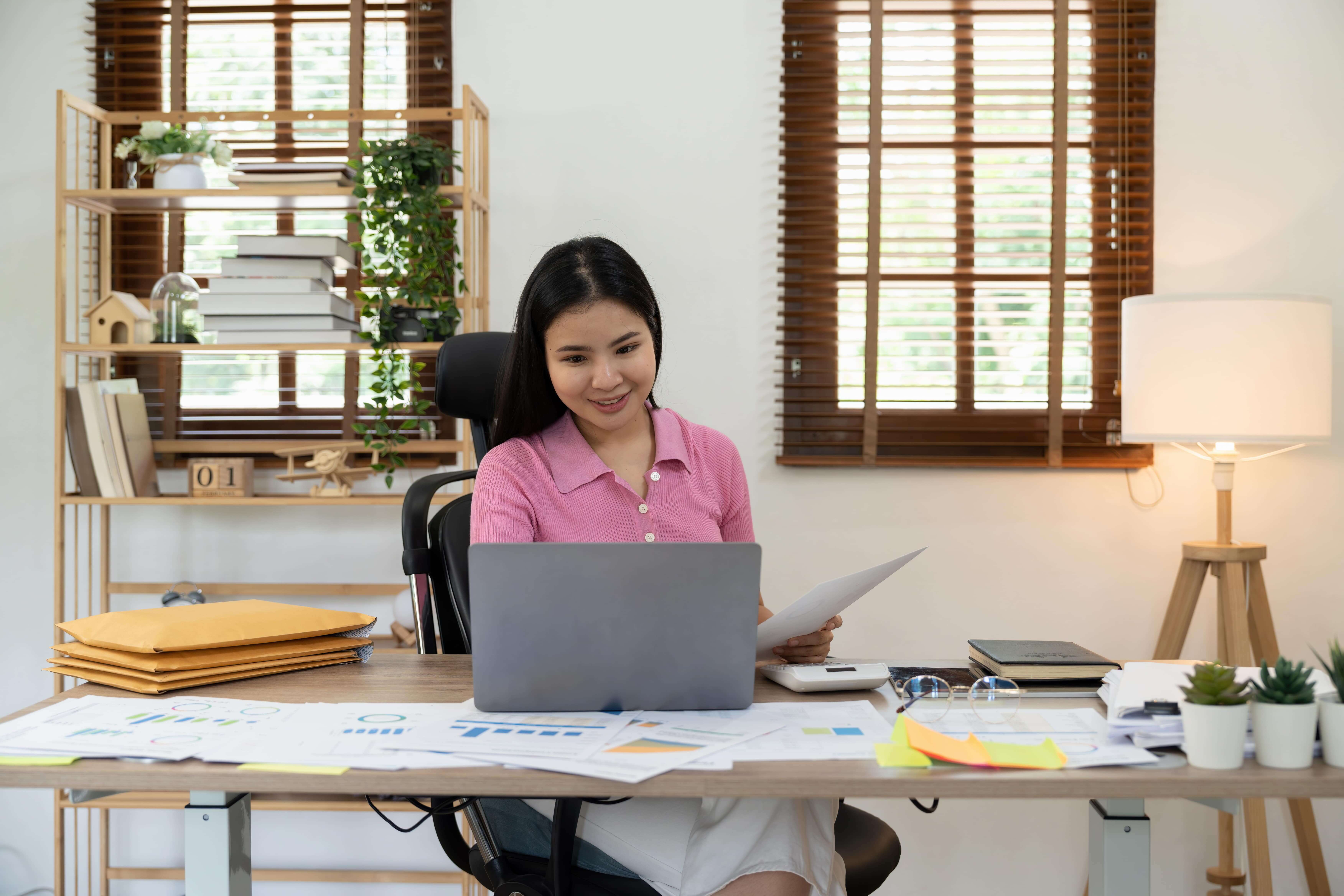 business-woman-or-accountant-working-on-laptop