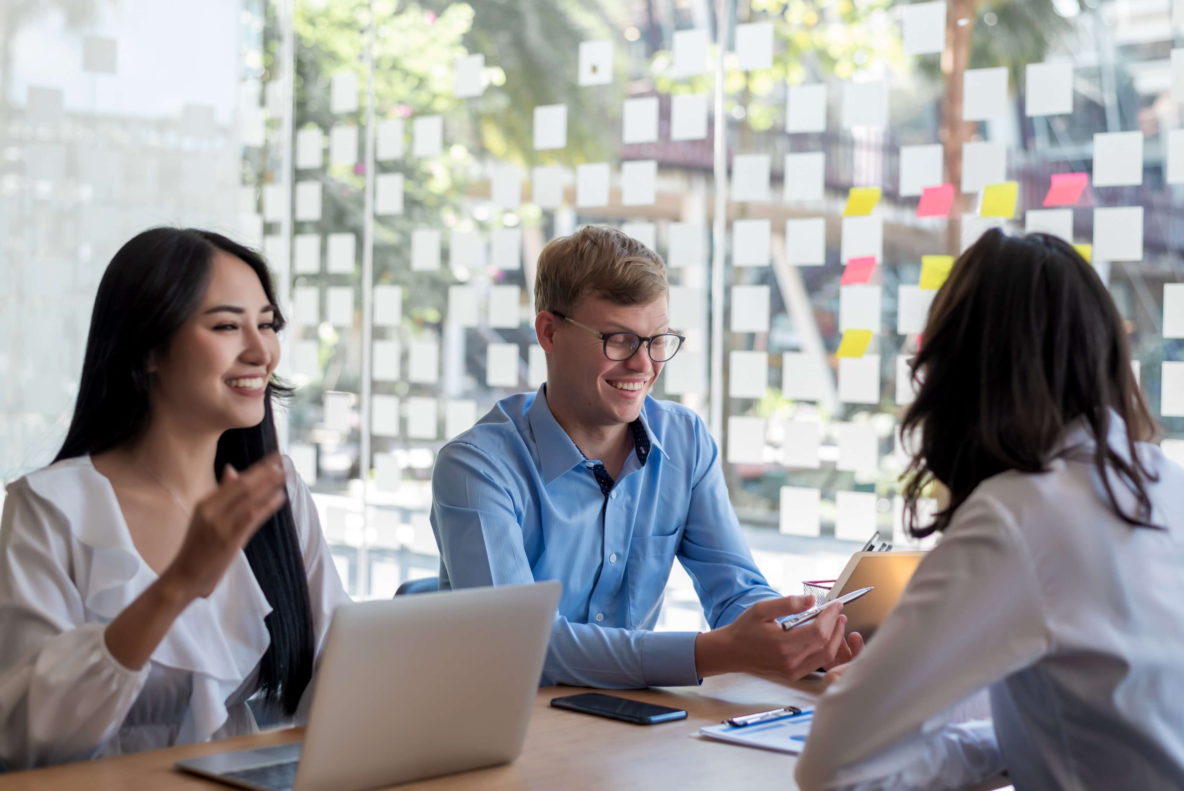 teamwork-asian-business-people-discussing-document-and-plan-financial-graph-analysis-at-meeting-room