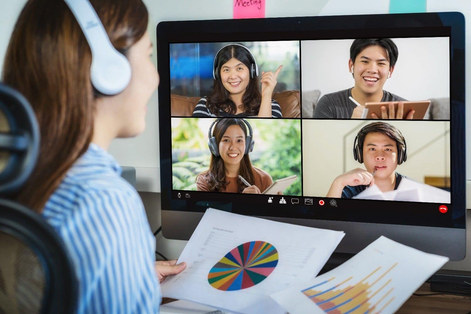 Focused Filipino virtual assistant working productively in a home office