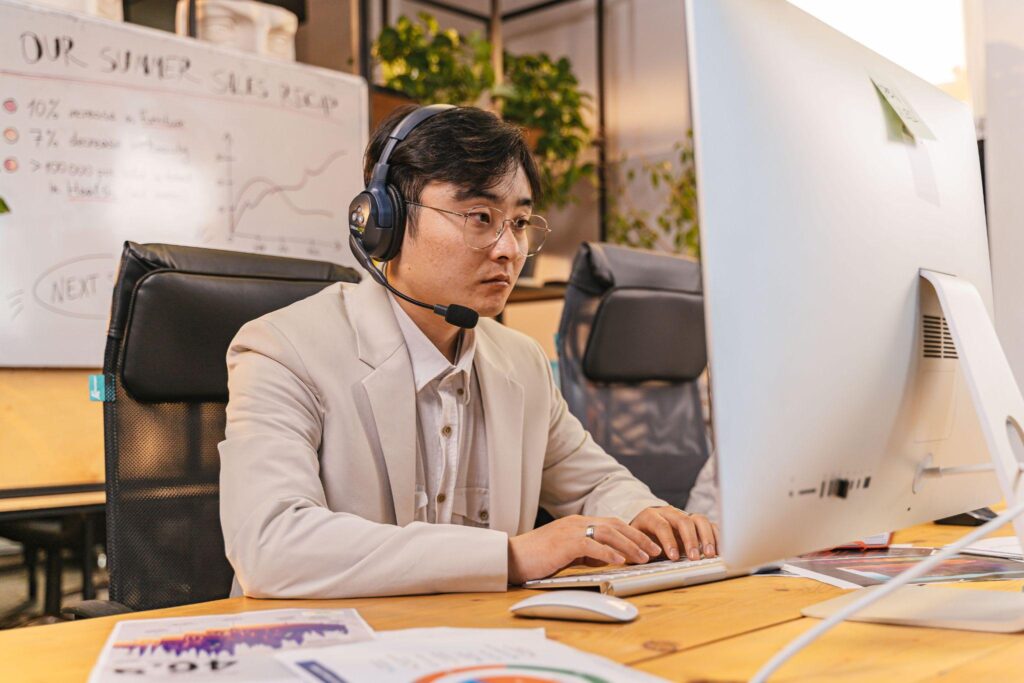 Male customer support agent headset computer