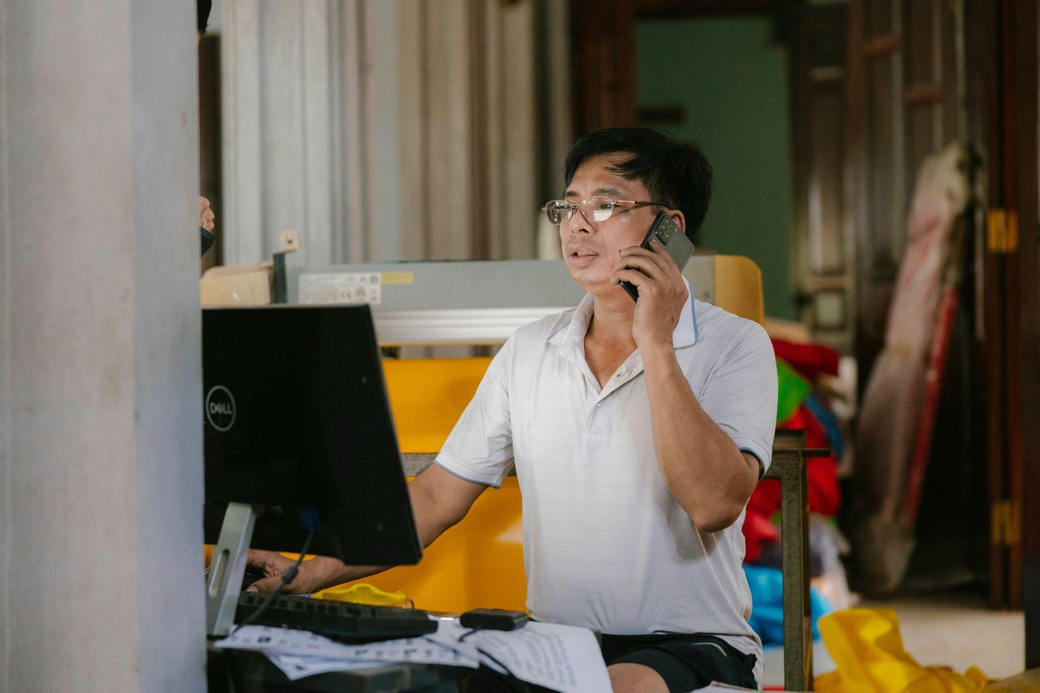 Office employee answering phone call