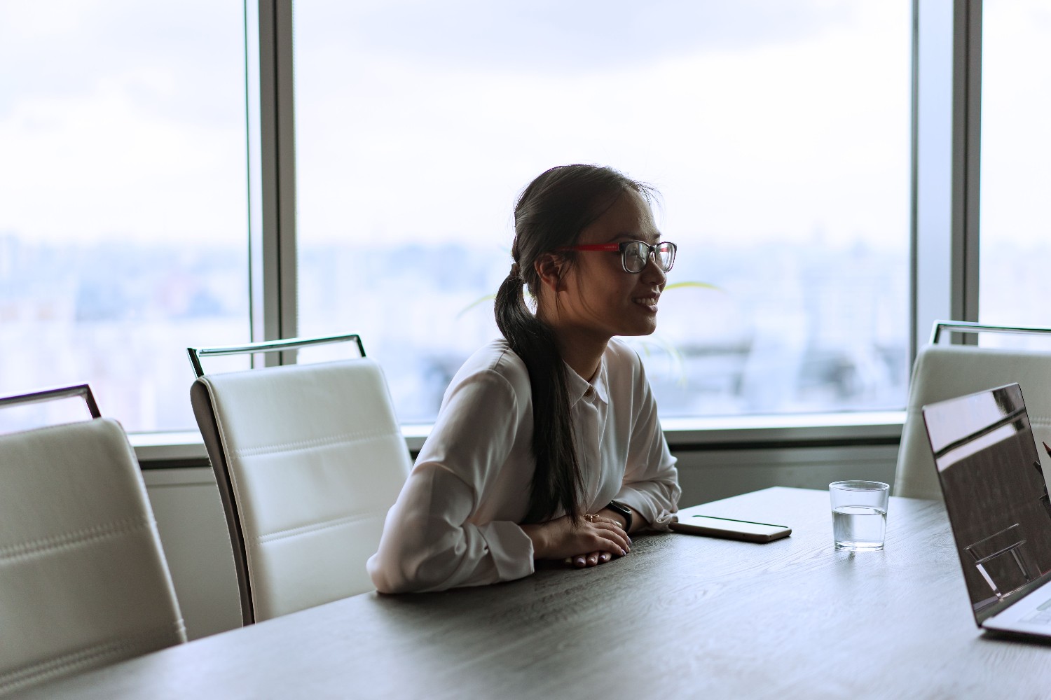 Corporate executive in conference room meeting