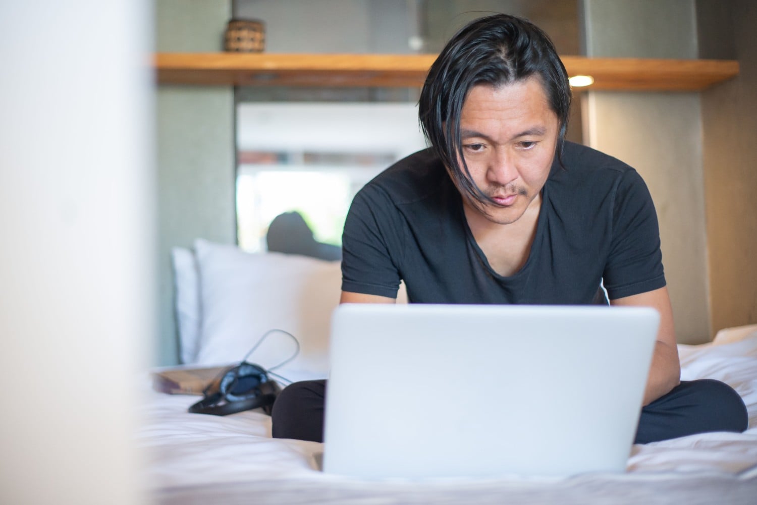 Remote worker using laptop in relaxed environment