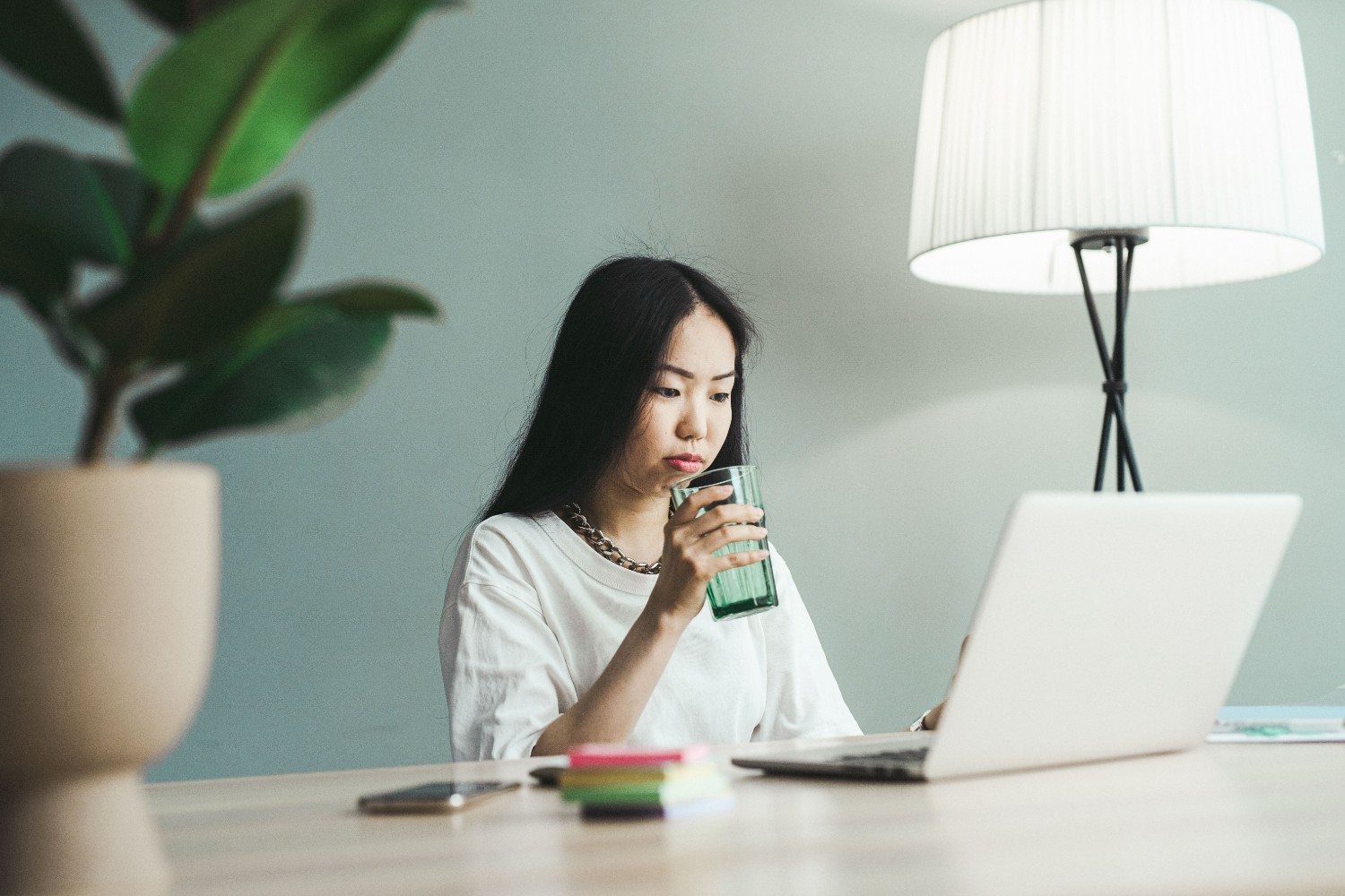 Virtual assistant taking a break at laptop